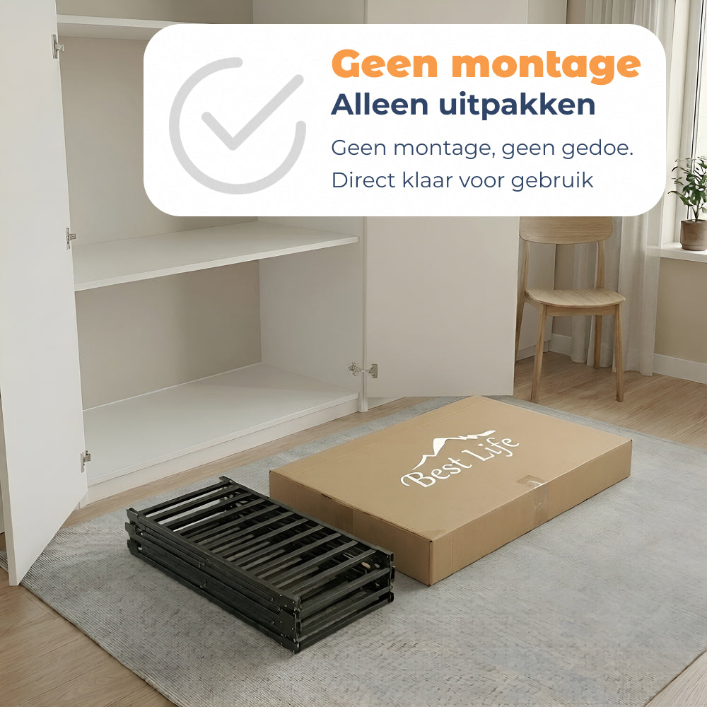 Bedframe Nera ingeklapt naast de doos, geen montage nodig
