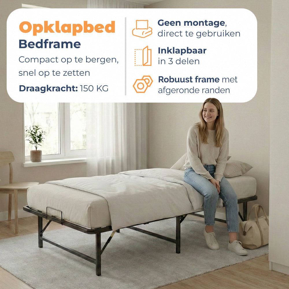 Vrouw zit op opklapbaar Bedframe Nera zonder montage, inklapbaar in 3 delen, draagkracht 150 kg